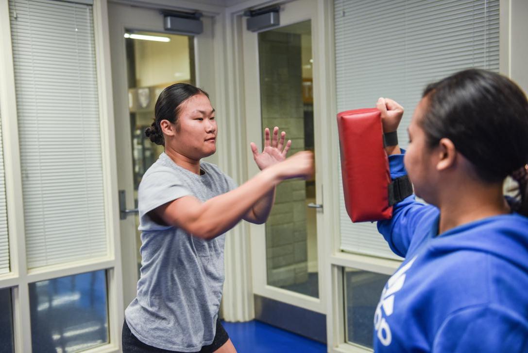 Student taking self-defense course.